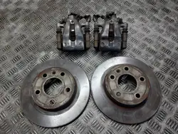 OEM TARCZE HAMULCOWE TYŁ + KLOCKI + ZACISKI OPEL ASTRA H