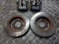 OEM TARCZE HAMULCOWE TYŁ + KLOCKI + ZACISKI OPEL ASTRA H