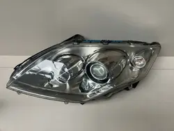 Vasen etuvalo Renault Laguna III Xenon 260600040R