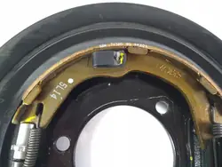 Chevrolet OE handbromsbacke med lock höger bak