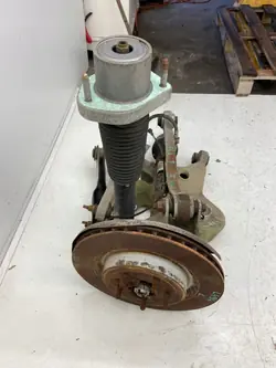 Bakre fjädringsarm vänster OEM NC DPLA-5B53-BA