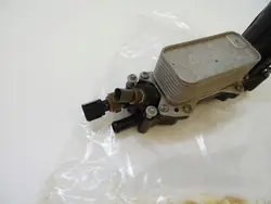 Öljynsuodatinpohja OEM 68105583AF 3.6 V6 Moottorille