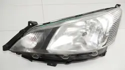 Farol dianteiro esquerdo Nissan NV200 usado OEM 360189040