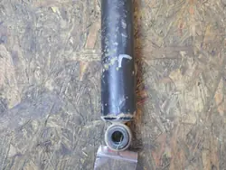 Taka-iskunvaimennin vasen OEM 897559554