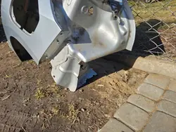 Opel Corsa F vasen takapyöränkaari, käytetty