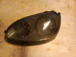 Vasen etuvalaisin VW Golf V