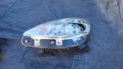 Farol esquerdo Renault Clio III Lift / 7701072004