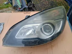 Lanterna dianteira esquerda Renault Scenic III