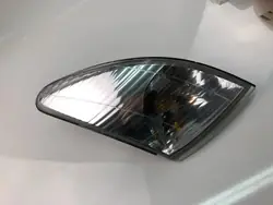 Vasen lokasuojavilkku OEM PY21W Mazda Premacy (CP)