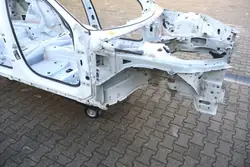 Volvo V90 II oikea etulokasuoja OEM 1274737375