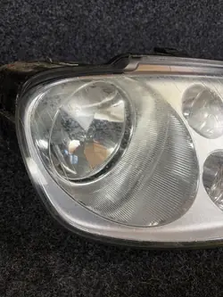 VW Touran I Rechter Frontscheinwerfer OEM 1T0941006F