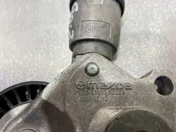 Tendeur de courroie alternateur OEM F56989710 Mazda CX-3
