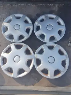 Juego de 4 tapacubos universales de 13" usados