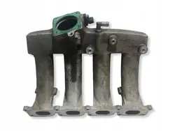 Colector de admisión usado OEM 06B133223D para VW Passat