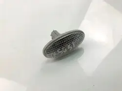 Pisca esquerdo do para-lama OEM 0C01 para Mazda 121 III