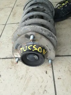 OEM TUCSON I AMORTYZATOR SPRĘŻYNA LEWY PRZÓD