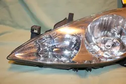 Linker Scheinwerfer OEM 89309071 für Peugeot 307 2001-2008