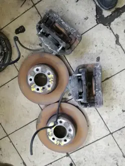 Bromsokar & Skivor Fram BMW E65 3.6 V8 OEM