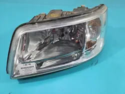 Farol esquerdo VW Transporter T5