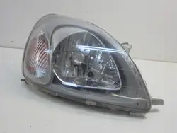 Refletor de farol direito TOYOTA YARIS I P1 OEM 212-11A2R