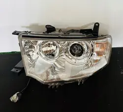 Faros izquierdo Mitsubishi L200 Pajero Sport 10-16r