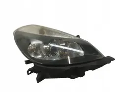 Farol Dianteiro Direito Renault Clio III (2005-2014) OEM 7701061076