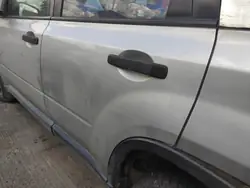 Takana vasen ovenkahva Nissan X-Trail II 2007-2010