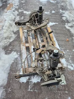 Mitsubishi OE Bakaxelupphängning Arm OEM Del