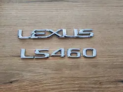 OEM 75443-50140 Lexus LS460 bagageluck emblem - Begagnad