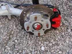 OEM Zwrotnica amrtyzator tył lewy Microcar Ligier JS