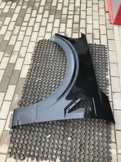Ford F-150 etulokasuoja OEM ML3Z-16006-A vasen
