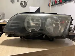 Farol esquerdo BMW E46 H7 dianteiro