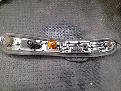 Soporte de bombilla faro trasero Fiat Panda II OEM 28029008 izquierdo