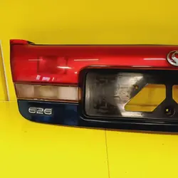 Moldura Porta-Malas Mazda 626 OEM DRC83956 Usado