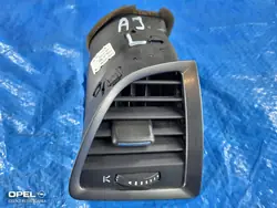 Rejilla ventilación izquierda consola OEM 13300579 Opel Astra J