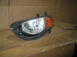 Faros delanteros izquierdo Mitsubishi Colt VI Z30 08- Europa