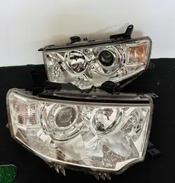 Faros Mitsubishi Pajero Sport L200 Halógenos OEM