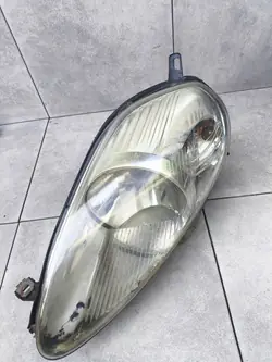 Lanterna Frontal Esquerda Fiat Grande Punto