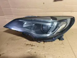 Opel Astra V linke Frontscheinwerfer OEM 39077802