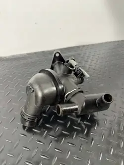 Caixa termostato Jaguar OEM G4D3-8575-AD Usado