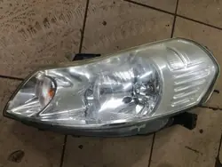 Farol dianteiro esquerdo Suzuki SX4 Sedici 2006-2009