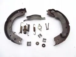 Juego de freno trasero derecho Mitsubishi Pajero III 99-06