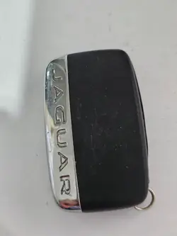 Mando Jaguar OEM FW93-15K601-BE Usado
