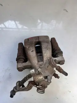 Opel Astra H bakre bromsokstag OEM 73737