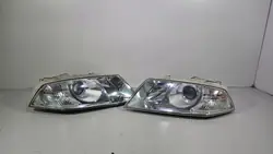 Skoda Octavia II 2 Scheinwerfer vorne L+R Linsen EU OEM 12764283634
