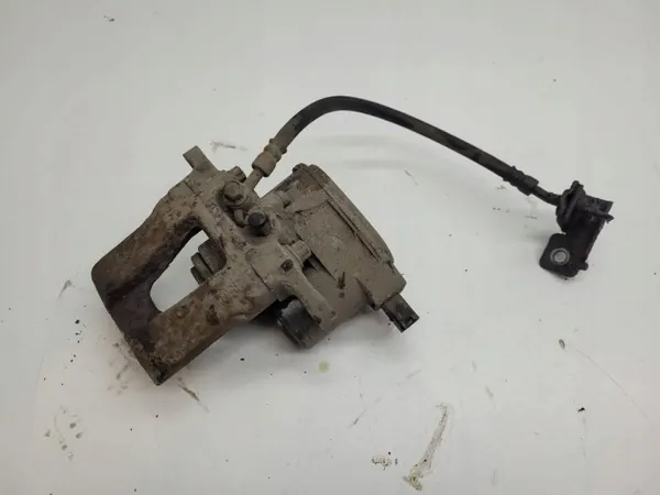 Pinza de freno trasera derecha OEM AUST131654 - Usada image 2