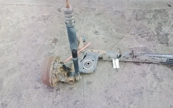 Dacia Duster I bakaxelbalk OEM Wrakowisko-7388- image 3