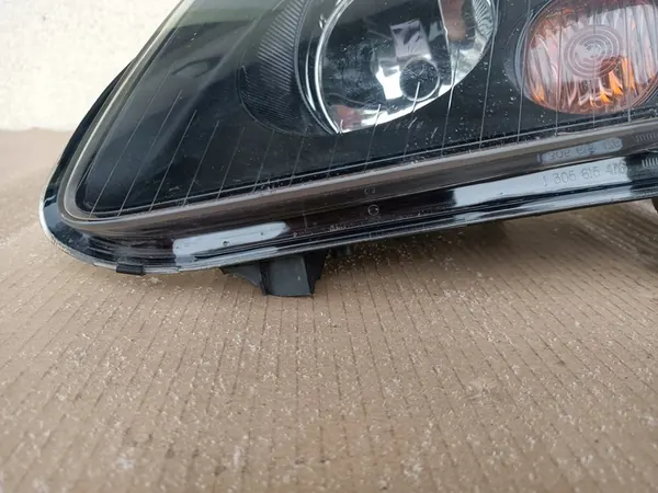 Vasen Etuvalaisin VW Touran I 03- Alkuperäinen Tumma 1T0941005P image 5