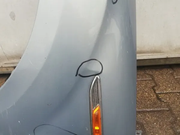 Ford OE 1702314 Paraurti Sinistro image 3