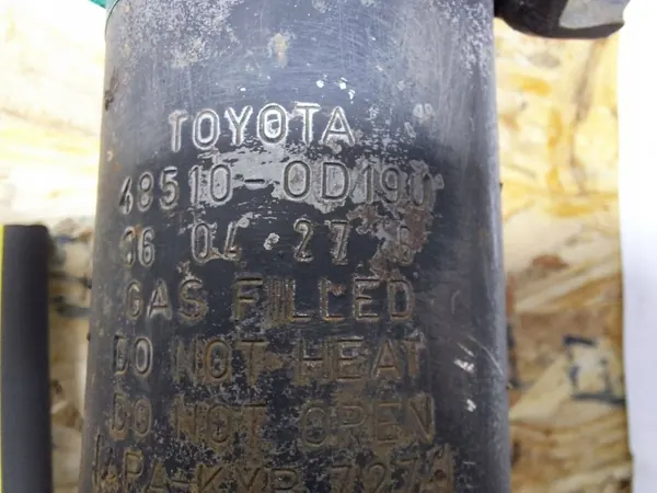 Amortiguador delantero derecho OEM 48510-0D190 Toyota image 4